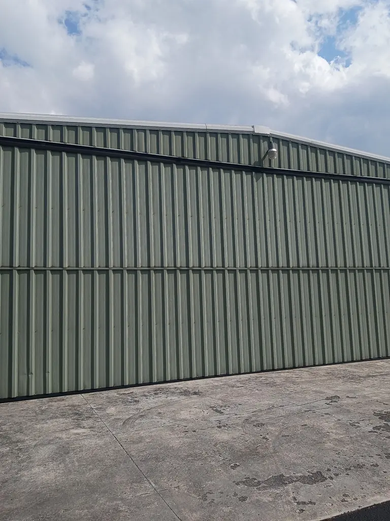 Green metal siding on a commercial building in Knoxville, Tennessee