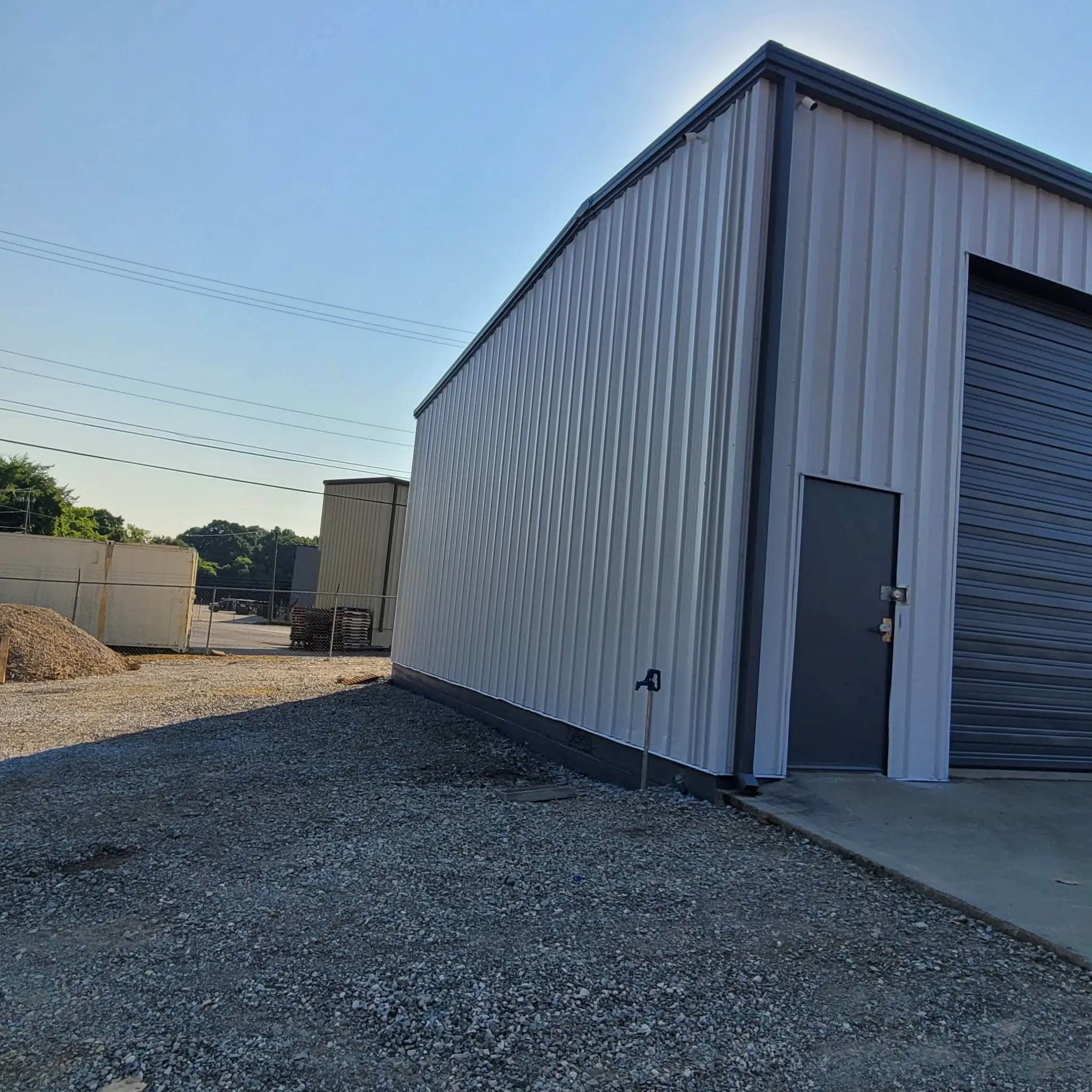 Freshly painted commercial metal building by ML Home Improvement in Knoxville, Tennessee
