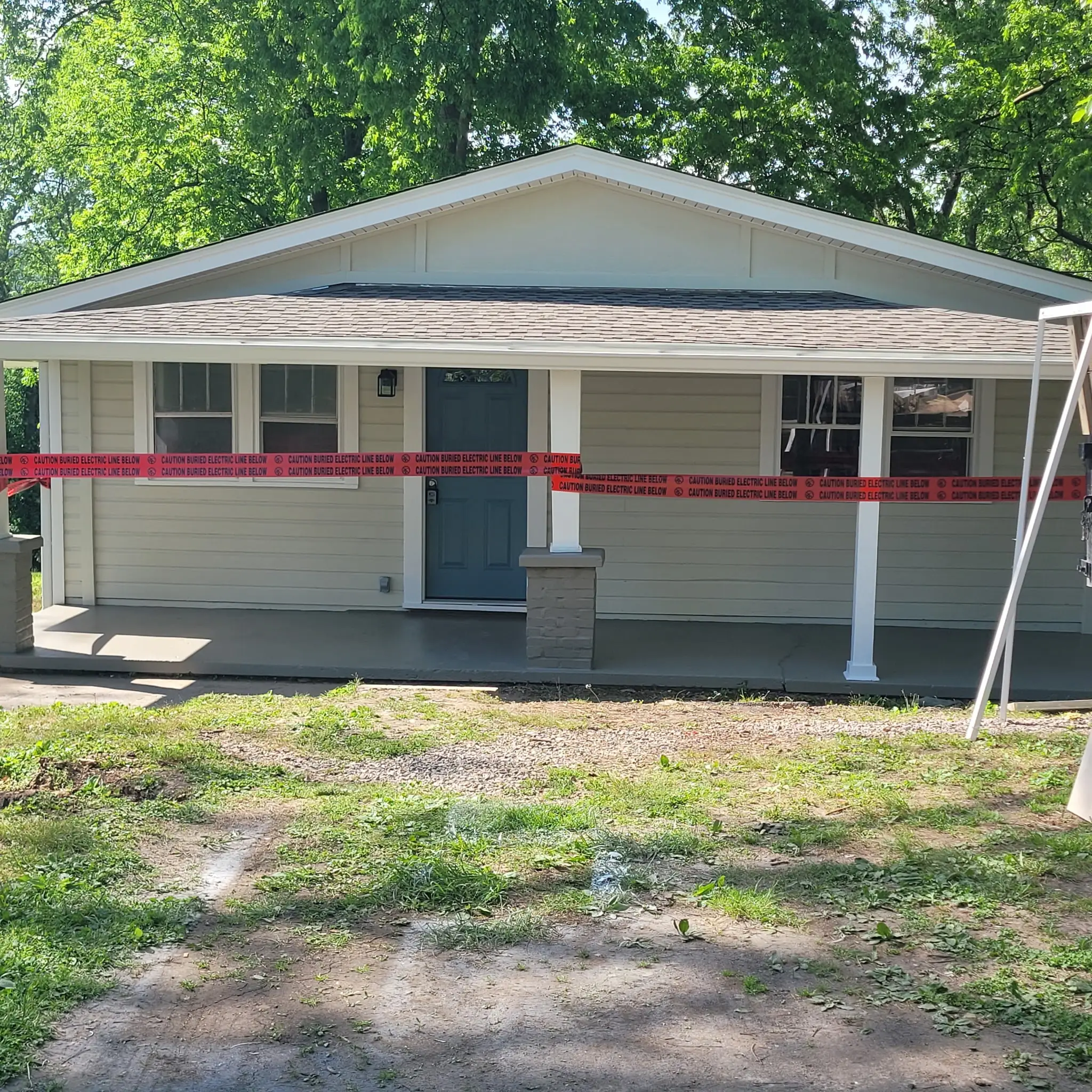 Home exterior and porch freshly painted in Knoxville, Tennessee